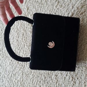 Velvet black hand purse